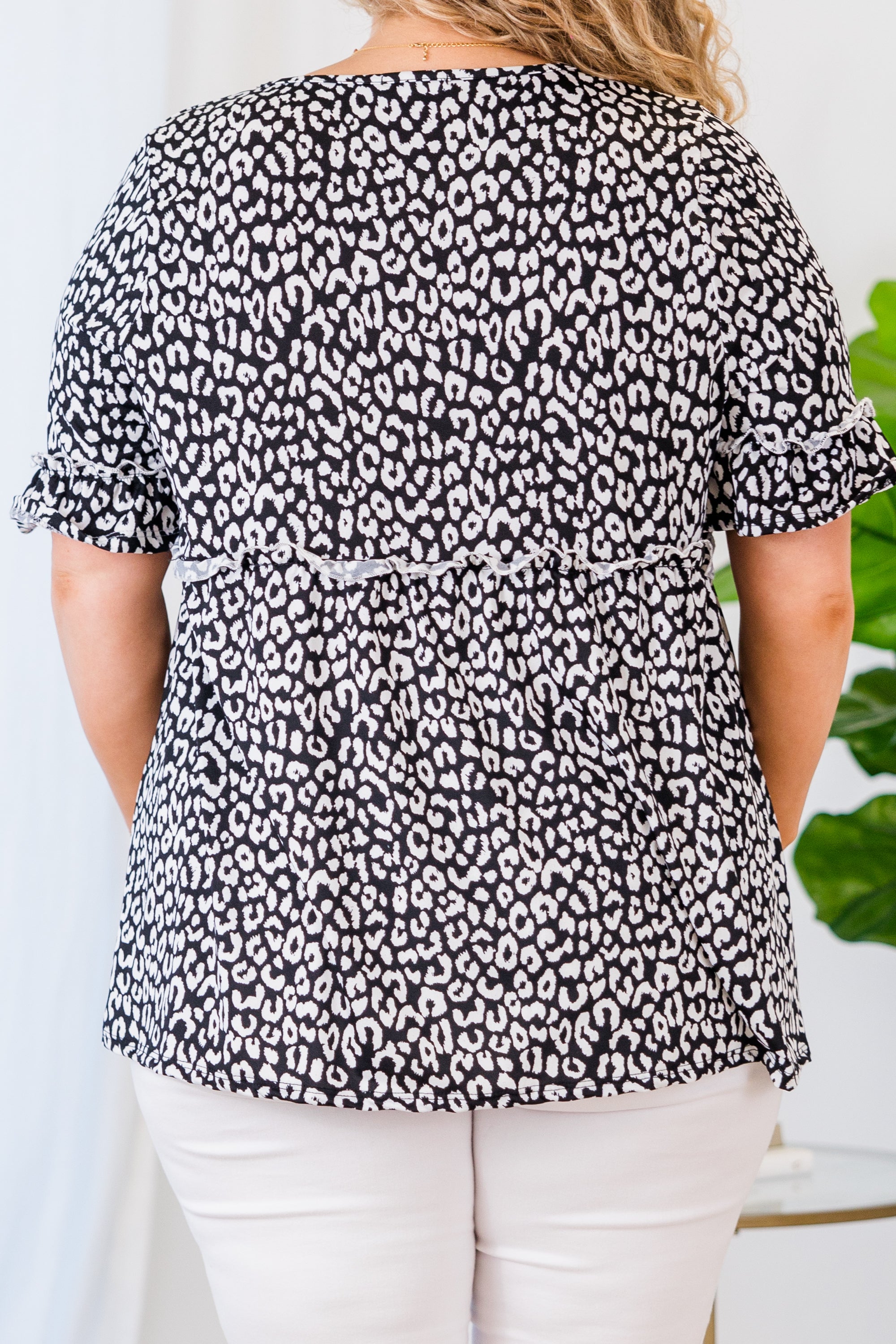 Sensational Flair Top. Black Leopard