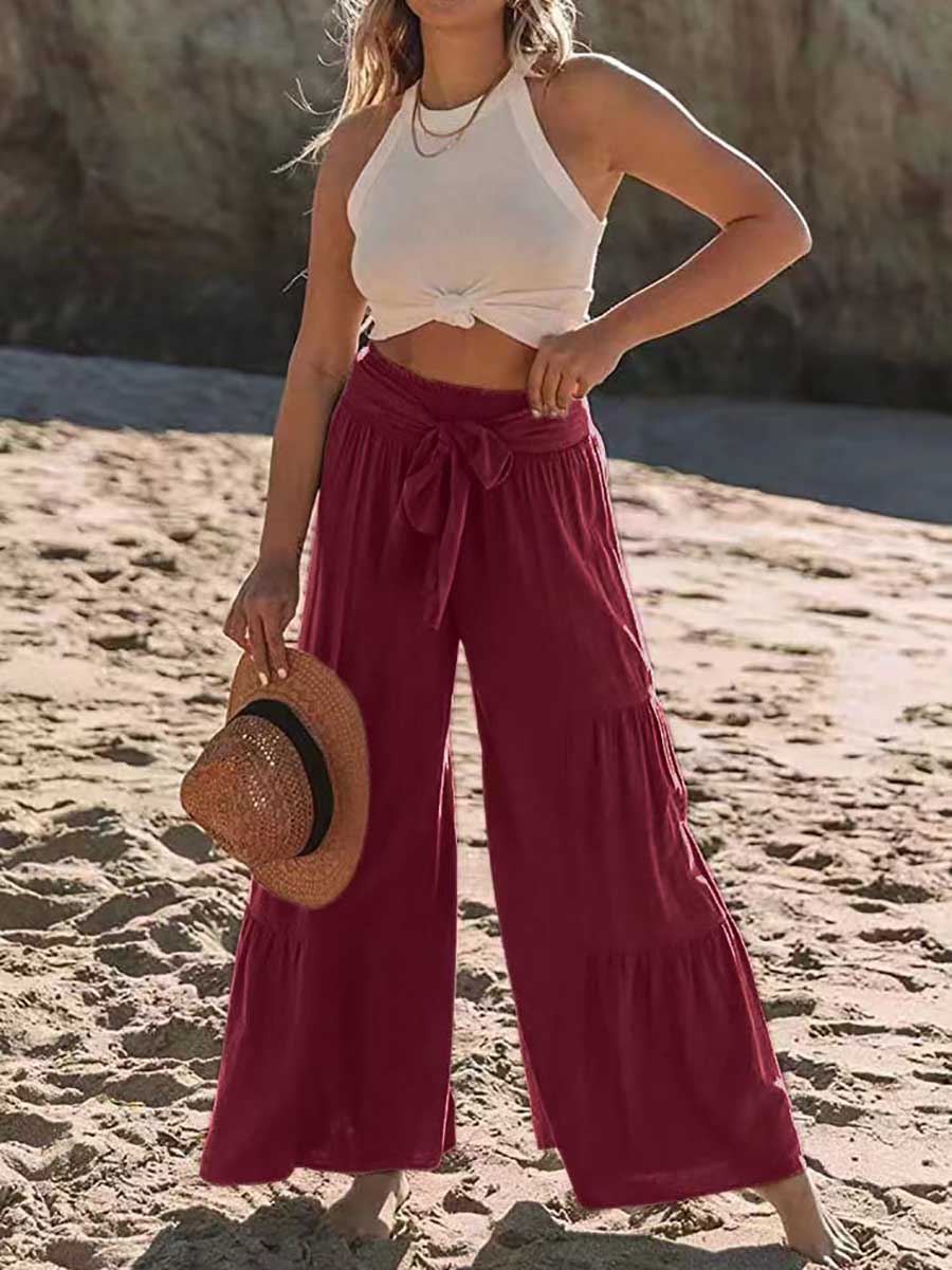 Strappy high-waisted pleated wide-leg pants