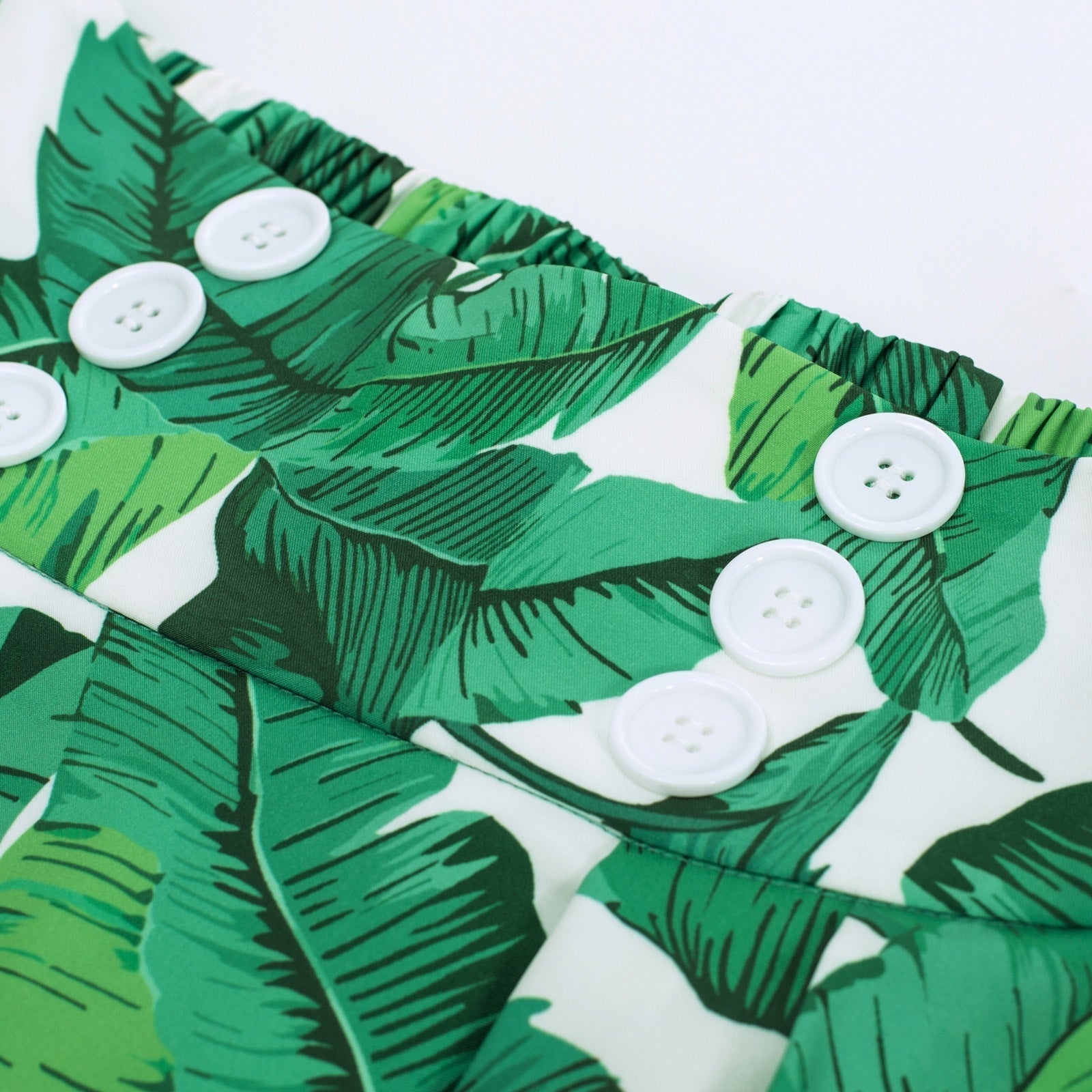 Leaf Patterns Pleated Buttons Decorated Elastic Waist High Waist Swing A-Line Skirt with Pockets