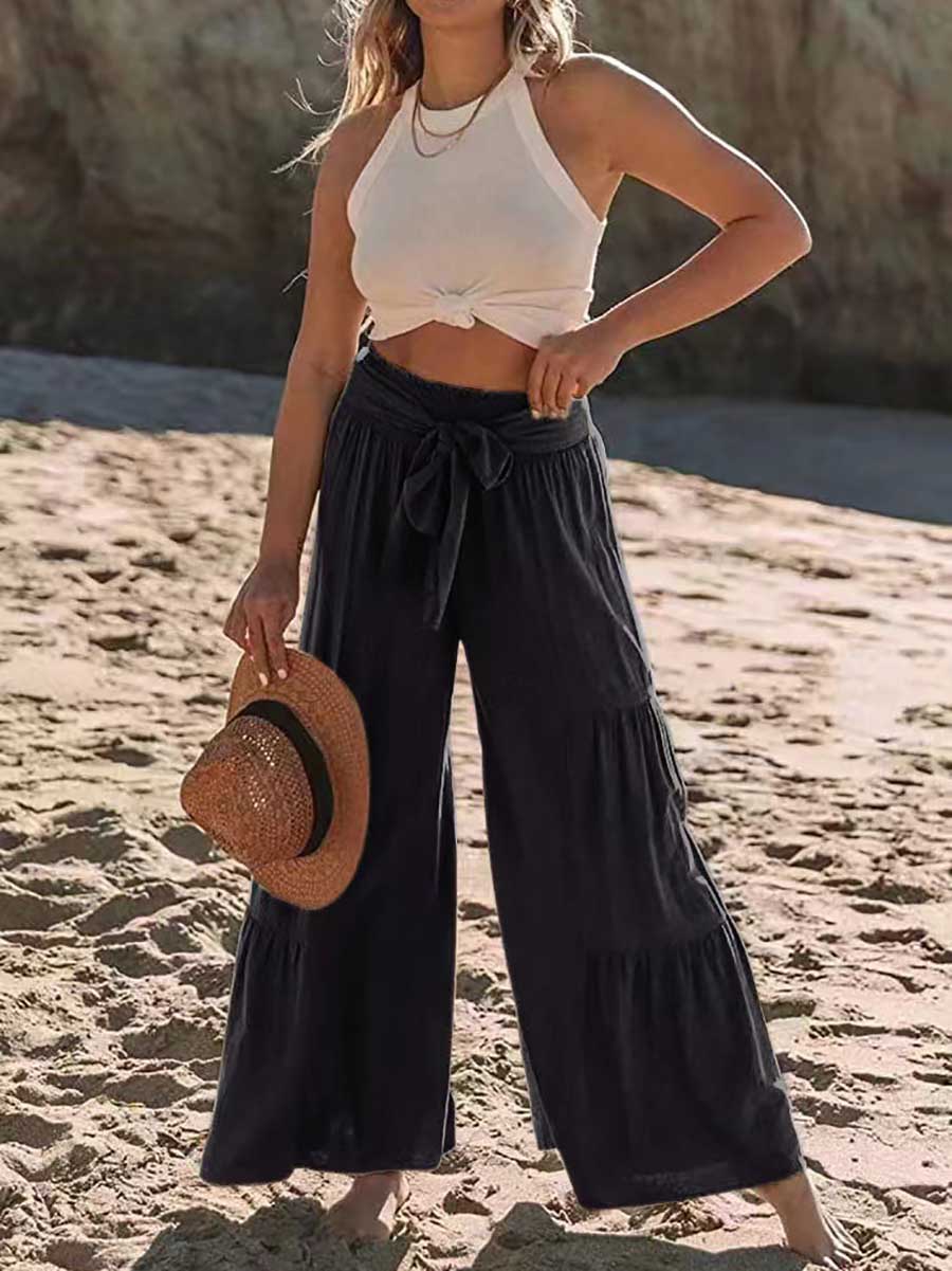 Strappy high-waisted pleated wide-leg pants